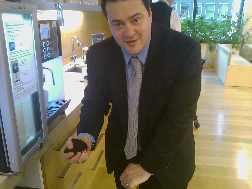 man in office drinking coffee man in office drinking coffee