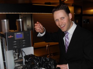 Jono with coffee grounds as part of the Ground to Ground initiative