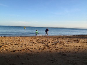 kids battle the beach